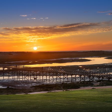 ホテル Wyndham Grand Algarve キンタ・ド・ラーゴ エクステリア 写真 Sunset over the San Marcos River